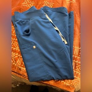 Figs yola skinny pants. size medium petite. Royal blue color.